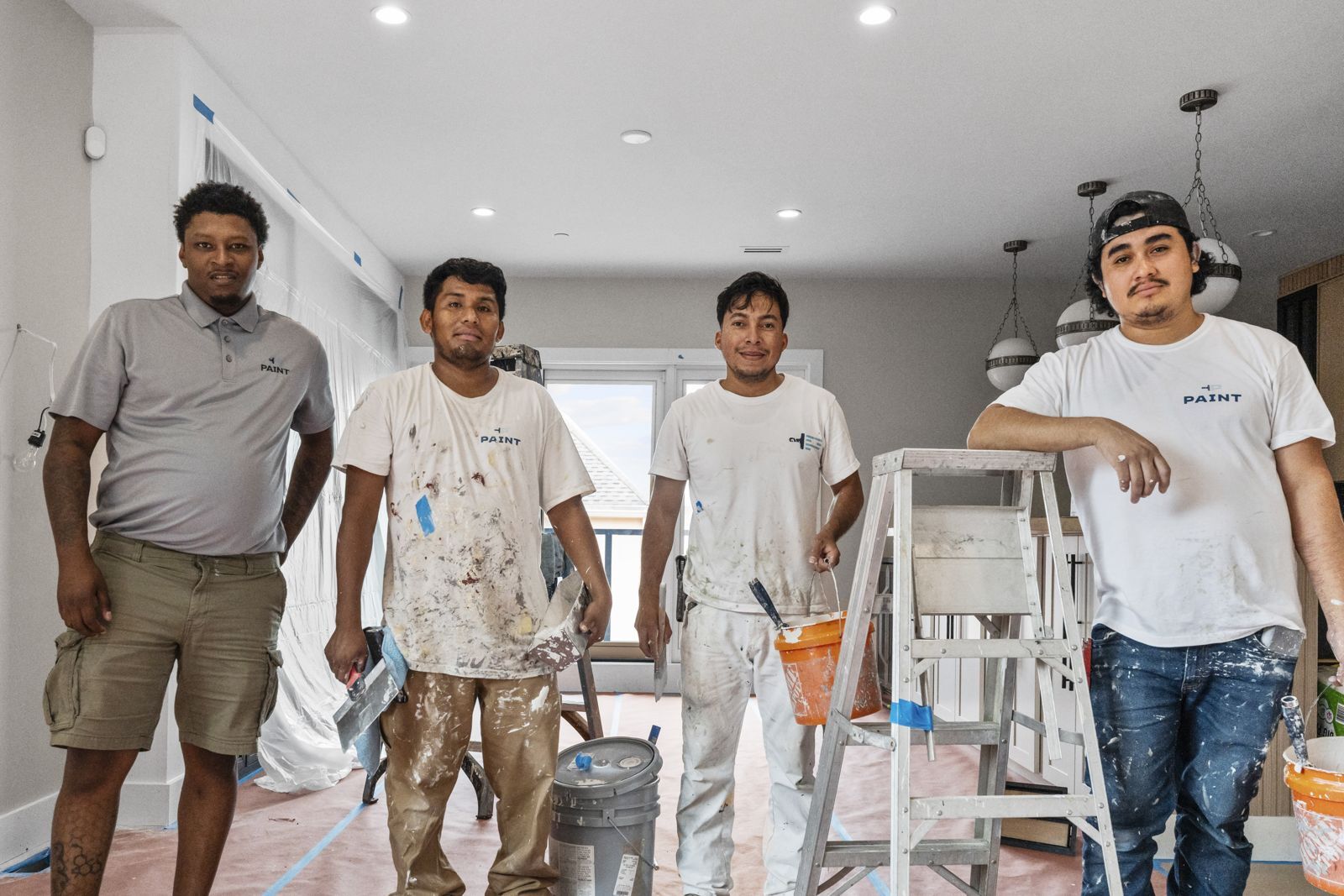 PAINT crew in a newly painted kitchen