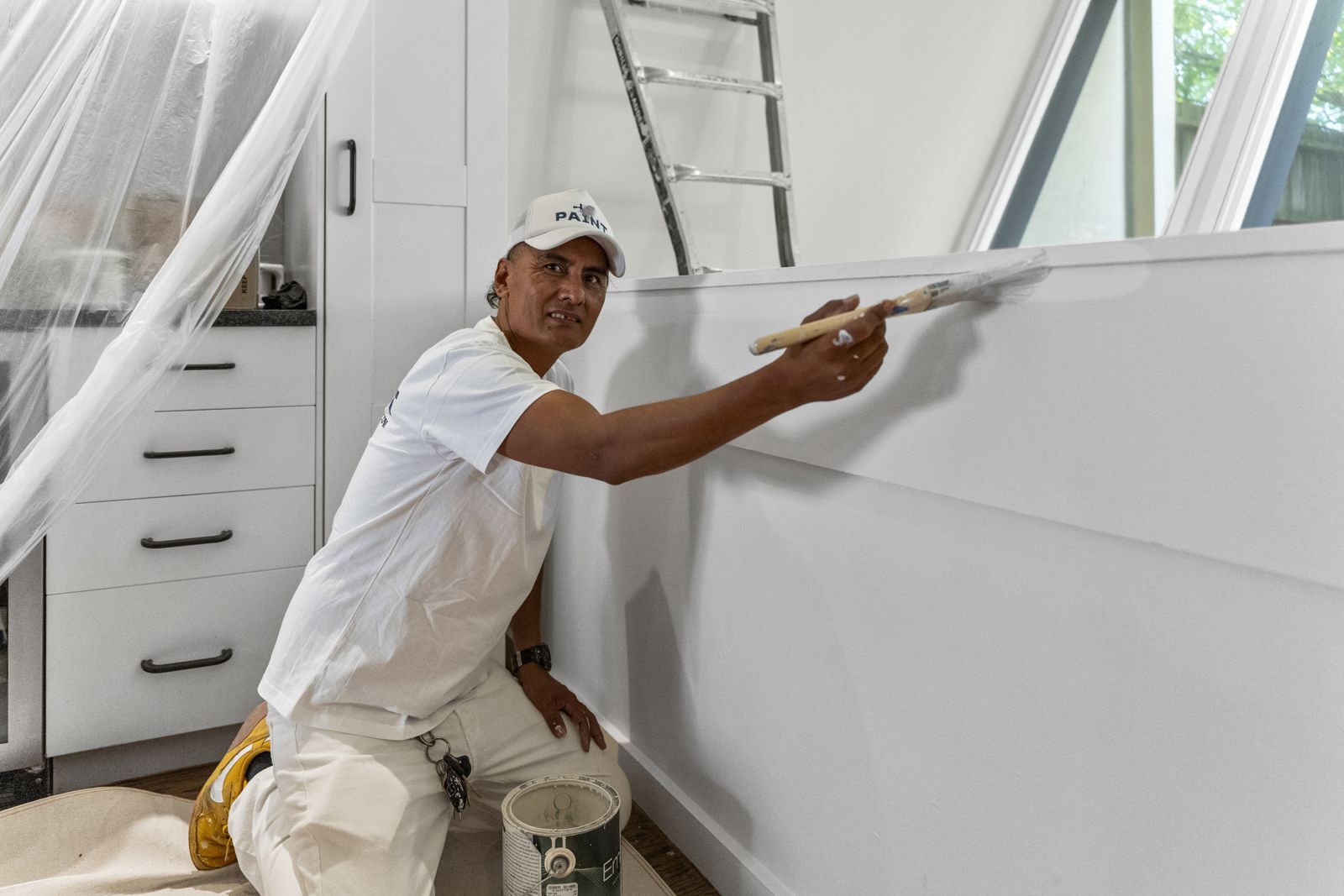PAINT painter brushing wainscoting