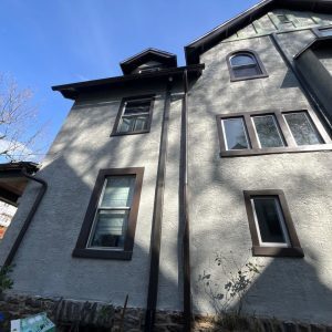 Exterior Painting in Harvey St • Philadelphia: Stucco Style with Bold Trim