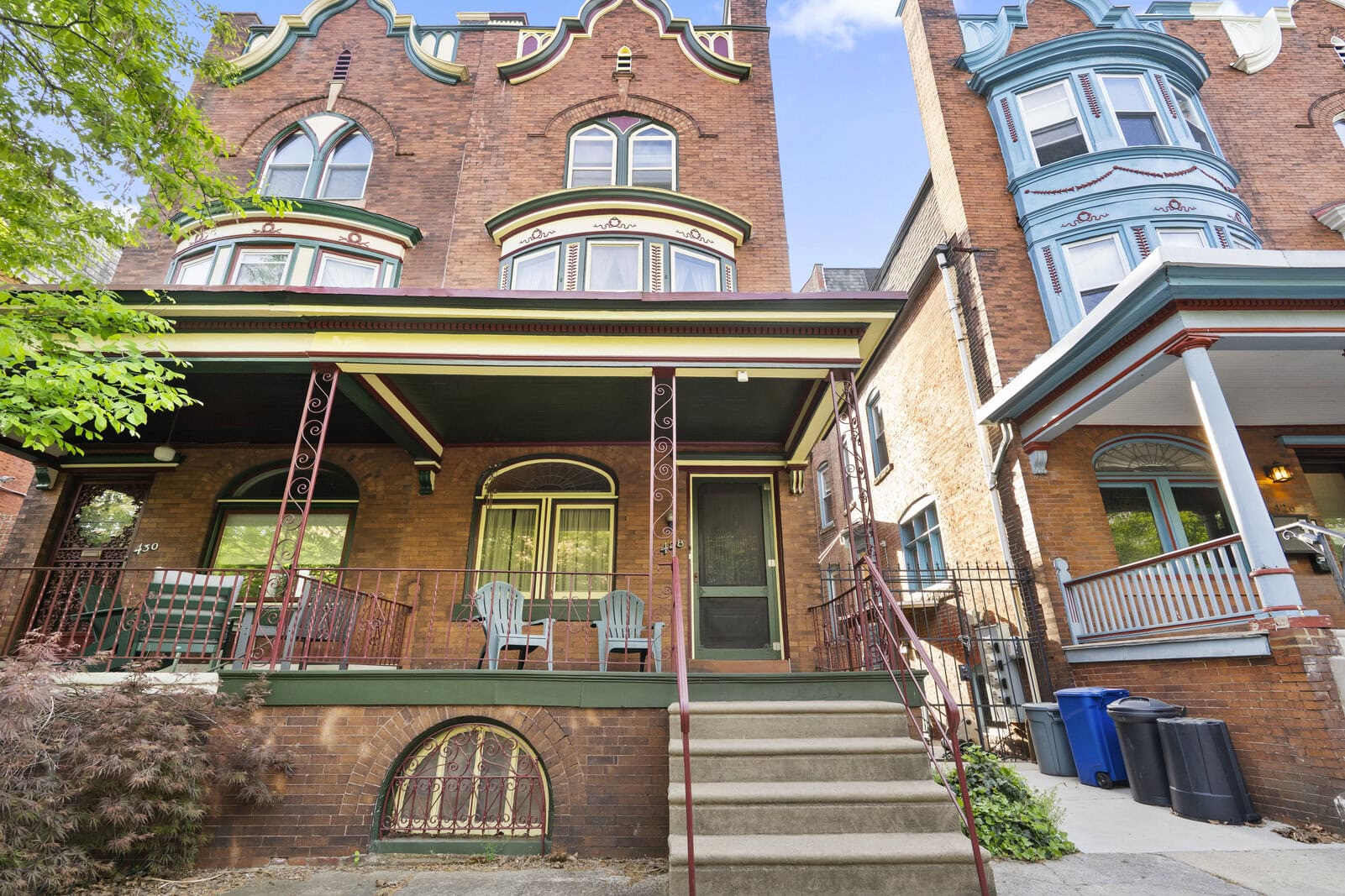 Painted brick rowhome porch and trim in University City, Philadelphia